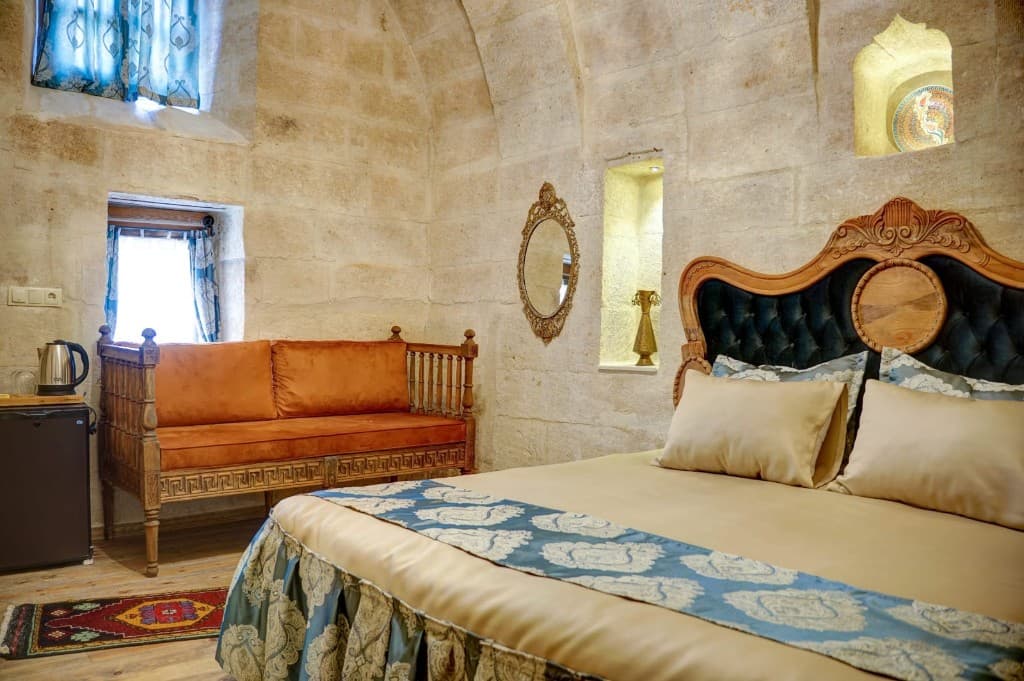Spacious suite living area in stone architecture
